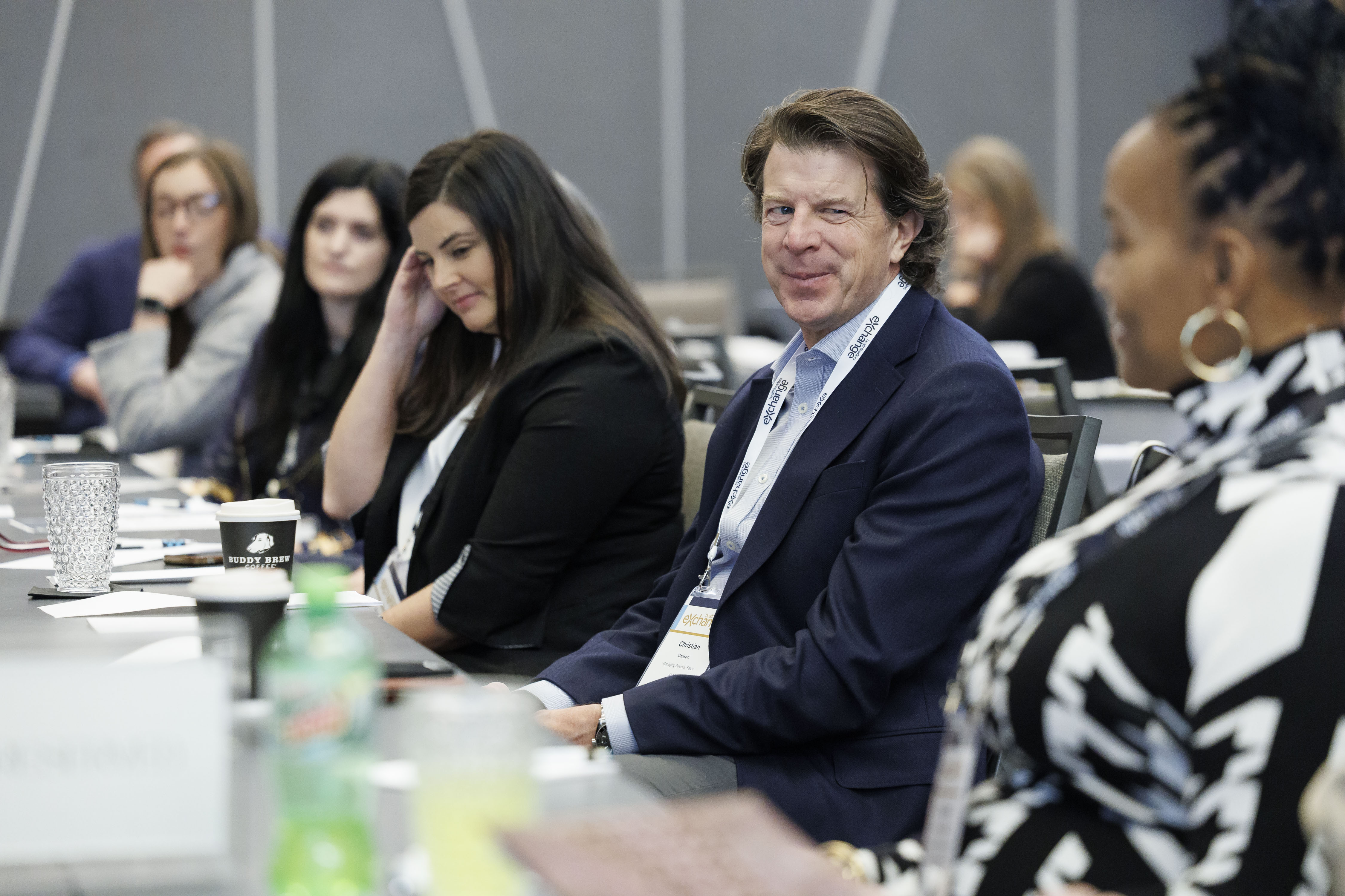 Executives in candid discussion at a roundtable exchange